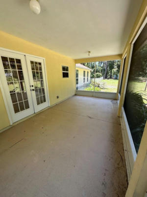 10750 NW 68TH TER, CHIEFLAND, FL 32626, photo 2 of 39