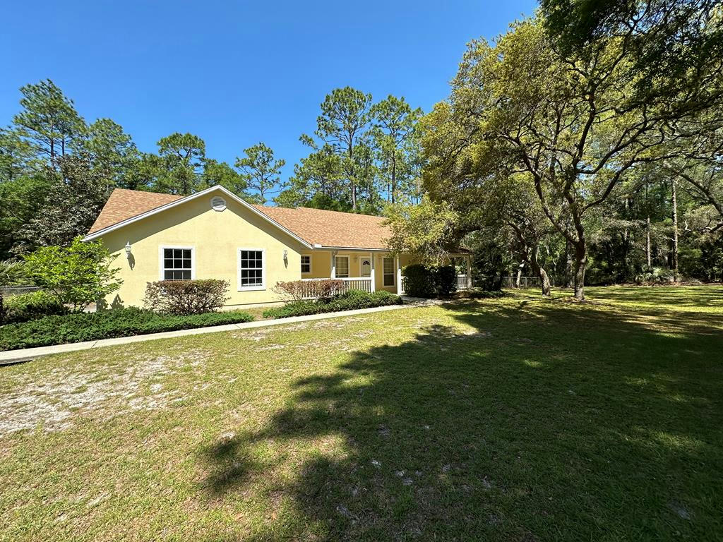 10750 NW 68TH TER, CHIEFLAND, FL 32626, photo 1 of 39